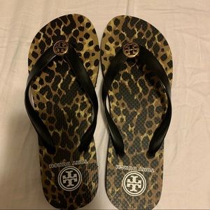 Tory Burch leopard flip flops. Never worn.